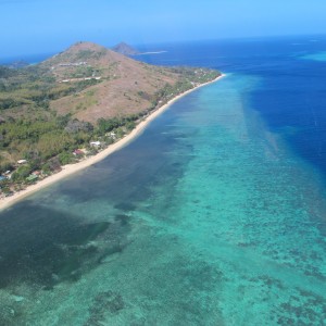 Mer Island - Aerial view of island and reef flat
